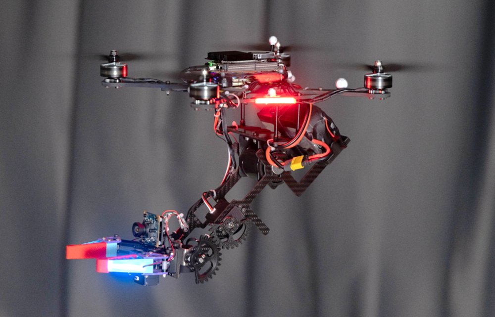 QuadHand: A Compact Quadrotor Aerial Manipulator with MRC-SDF-Based Whole-Body Motion Planning Figure 1