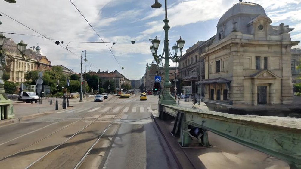 DreamDrive: Generative 4D Scene Modeling from Street View Images Figure 1