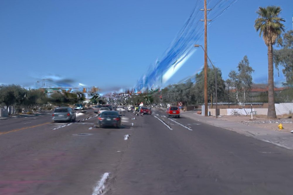 ReconDreamer: Crafting World Models for Driving Scene Reconstruction via Online Restoration Figure 1